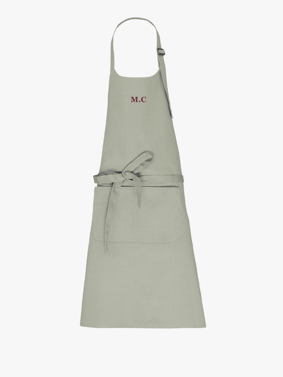 Delantal liso bordado