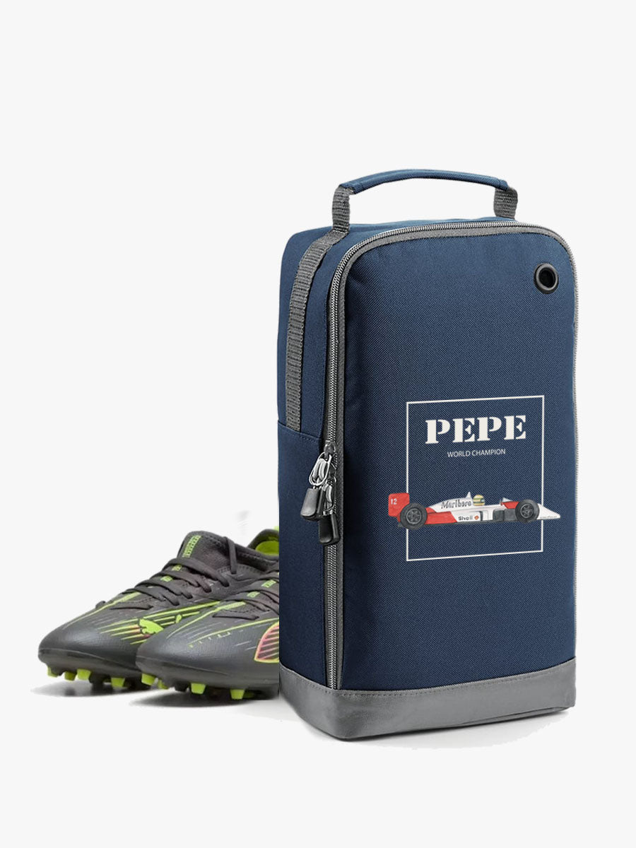 bolsa de zapatillas de color azul con diseño coche senna personalizado con el nombre